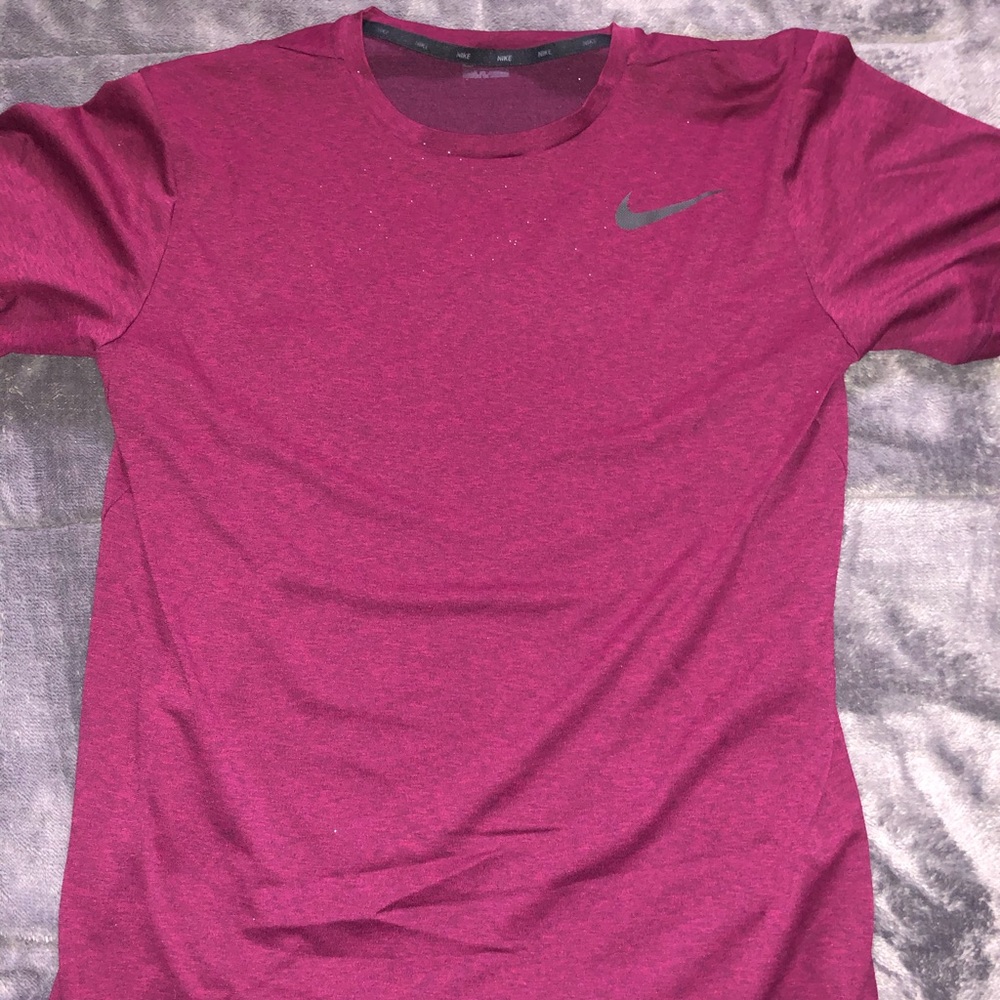 Burgundy Dri-fit nike shirt.